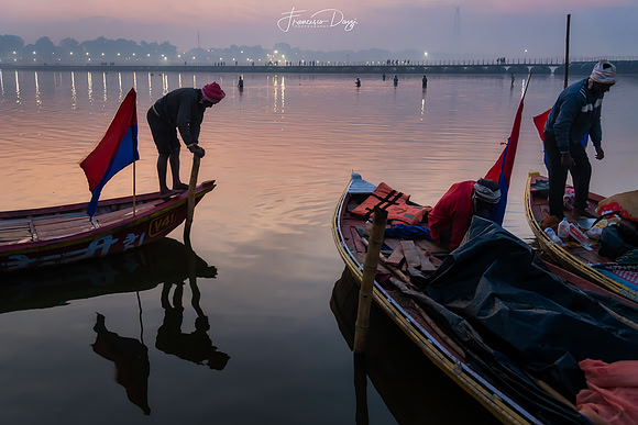 Boatmen at dawn on the sacred Ganges India Kumbh Mela 2025