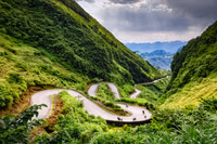 A Silver Ribbon Through the Emerald Highlands: Tham Ma Pass Vietnam landscape