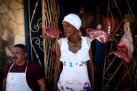 Butcher shop Trinidad Cuba woman elder portrait