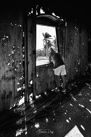 window Cayo Jutias man light palm Cuba lighthouse interior