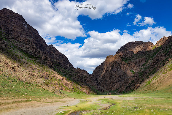The entrance to Yolyn Am landscape Mongolia mountains deep light shadow